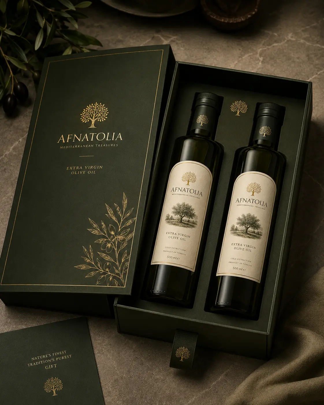 Drawer-style gift box holding two olive oil bottles